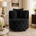 Black velvet swivel chair in a warm American living room
