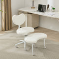 Modernein ergonomic cross legged swivel chair in an ivory home office setting