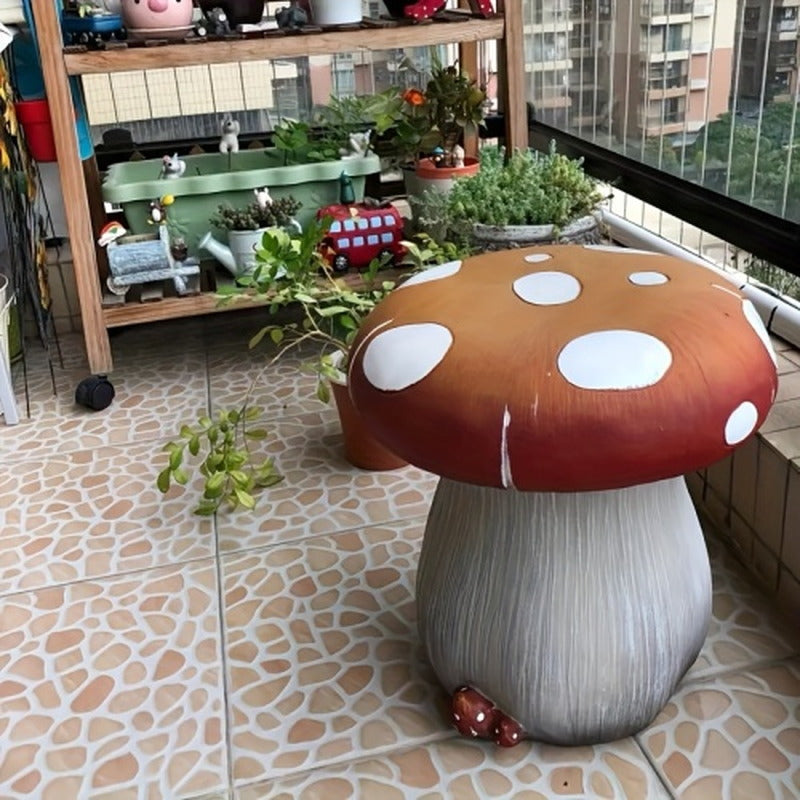 Oversized mushroom statue stool on a balcony patio