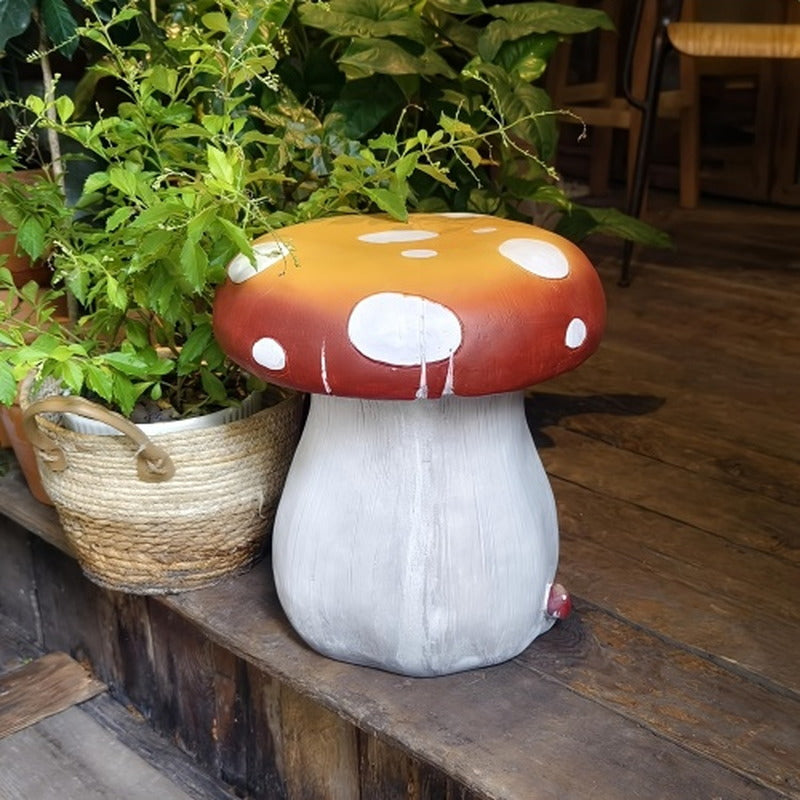 Mushroom statue stool with forest base on a wood deck